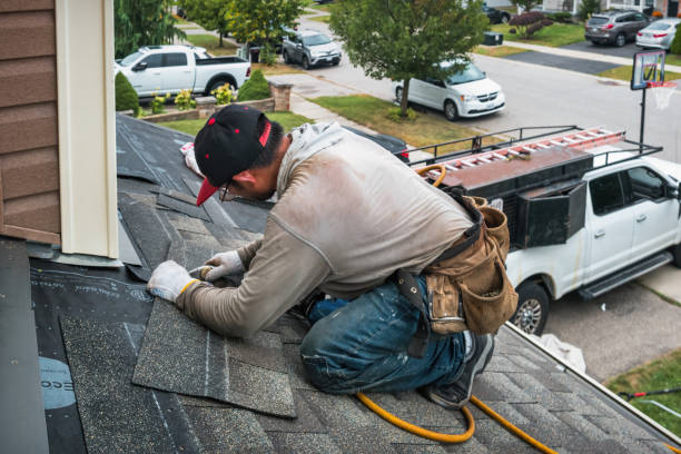 Professional Roofing technician working in Lake Delta, NY